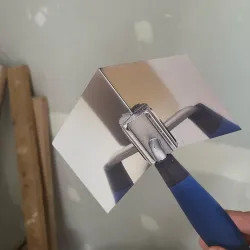 Click here to see Mintcraft 16460-ESH3L Vulcan Steel Drywall Corner Trowel with ErgoSoft Handle - 16460-ESH3L
