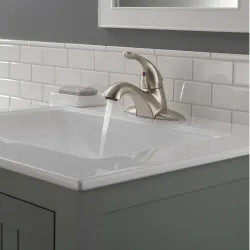 Click here to see Delta 520-SSMPU-DST Delta Classic Low-Arc Stainless Lavatory Faucet for 4