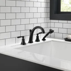 Click here to see Delta T4732-BL Delta Woodhurst Two-Handle Roman Tub Faucet Trim w/ 1.75 GPM Single-Setting Hand Shower, Lever Handles, Matte Black - T4732-BL