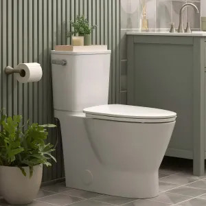 American Standard 252AA899.020 American Standard Aspirations Skirted Two-Piece Elongated Toilet w/ Seat, 1.28 GPF, Left Trip Lever, White - 252AA899.020