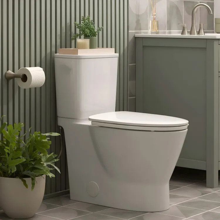 American Standard Aspirations Skirted Two-Piece Elongated Toilet w/ Seat, 1.28 GPF, Right Trip Lever, White - 252AA898.020